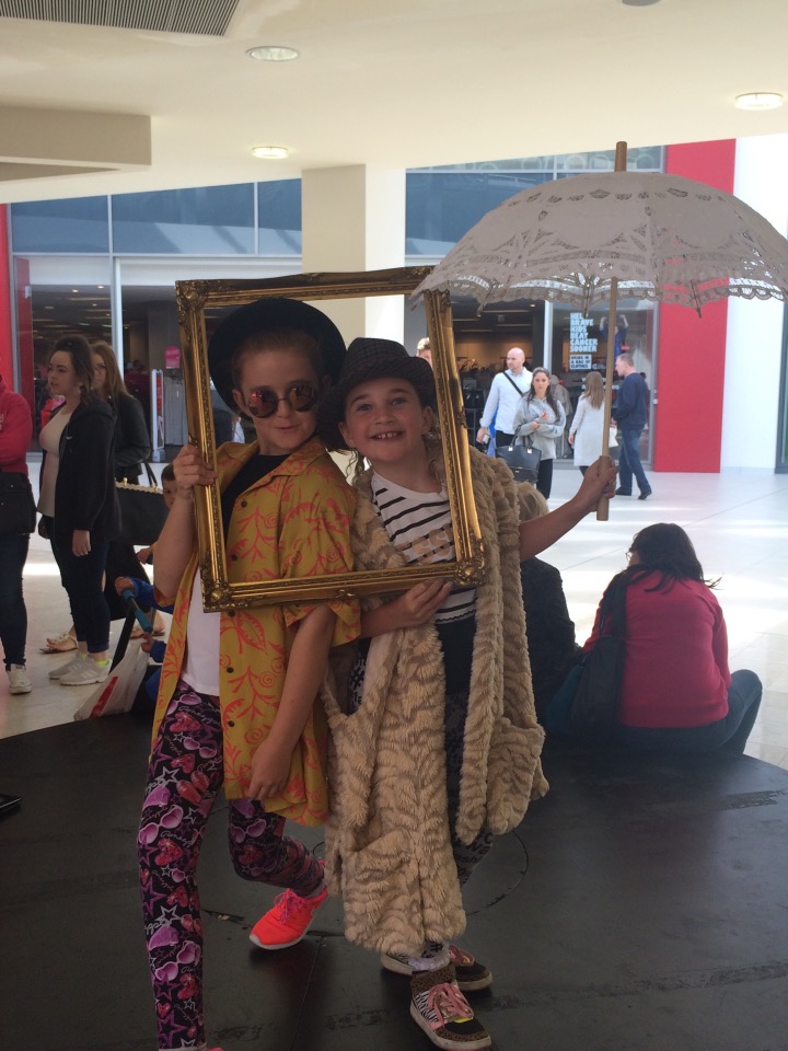 Frankie and Zizi at the Style Evolution selfie station in vintange clothes.jpg thumbnail