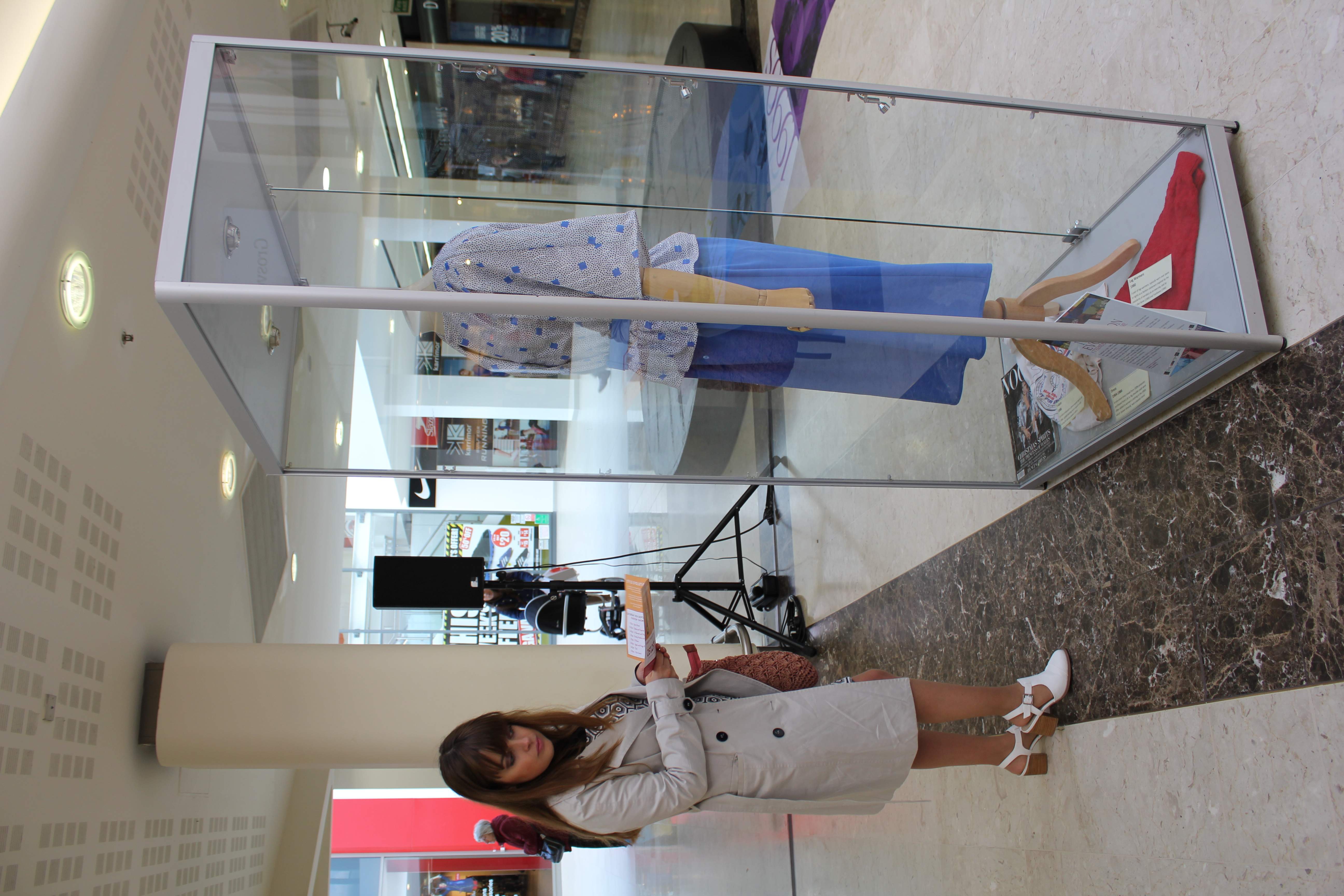 A shopper learning about garments from the past supplied by Grosvenor museum.JPG thumbnail